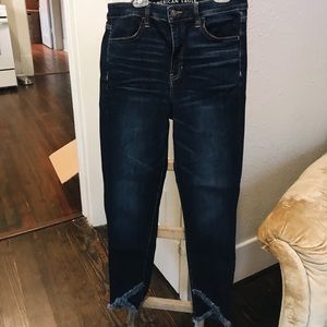 American Eagle distressed hem skinny jeans